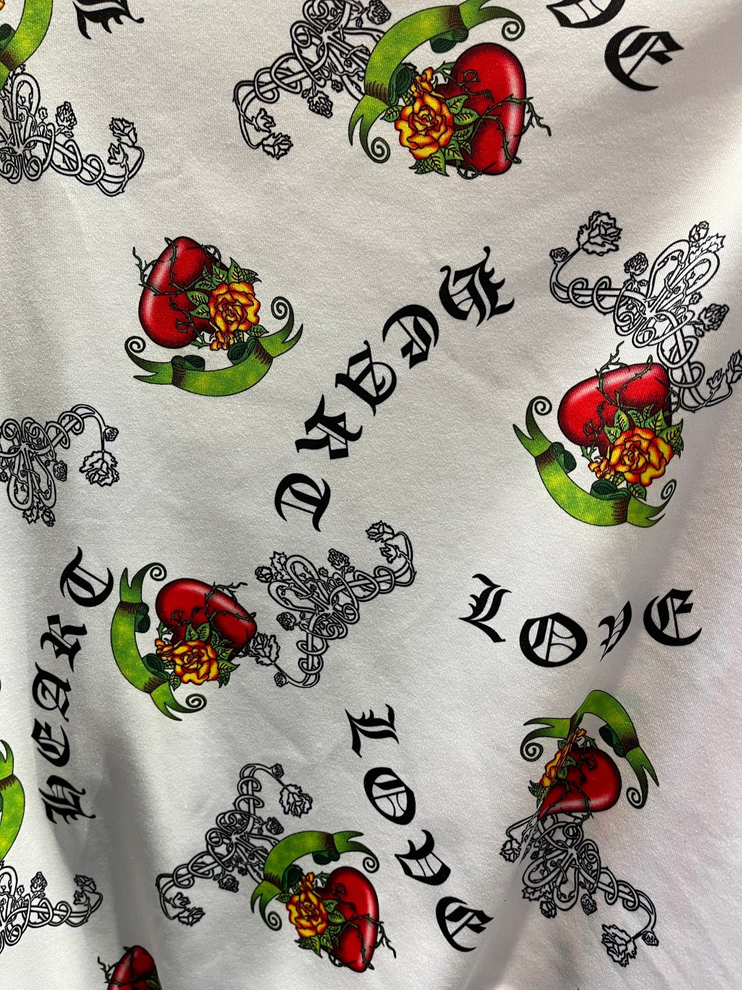 Great Love design print on poly spandex white/red 4-way stretch 58/60” Sold by the YD. Ships Worldwide from Los Angeles California USA.