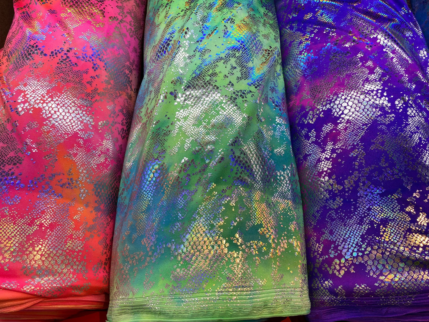 New tie dye Cobra design snake skin foil print on best quality of nylon spandex 4-way stretch 58/60” Sold by the YD. Ships Worldwide