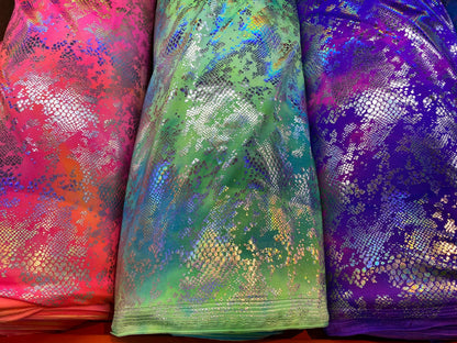 New tie dye Cobra design snake skin foil print on best quality of nylon spandex 4-way stretch 58/60” Sold by the YD. Ships Worldwide