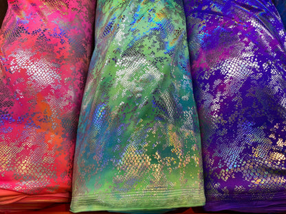 New tie dye Cobra design snake skin foil print on best quality of nylon spandex 4-way stretch 58/60” Sold by the YD. Ships Worldwide