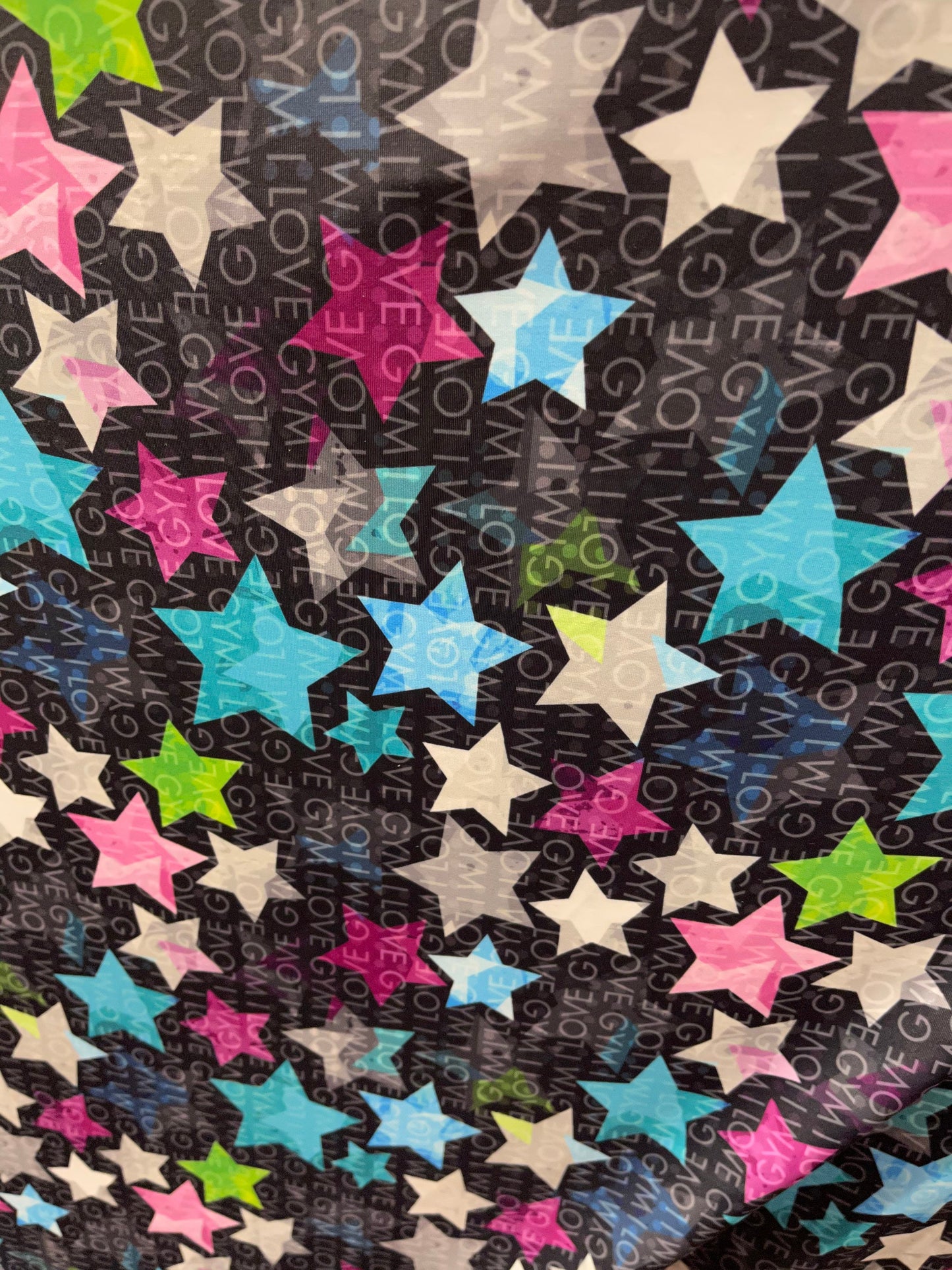 Stars design black/multicolor print on best quality of nylon spandex 4-way stretch 58/60” Sold by the YD. Ships Worldwide from Los Angeles