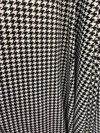 New Houndstooth design print on poly spandex 2-way stretch 60/62” Sold by the YD. Ships Worldwide from Los Angeles California USA.