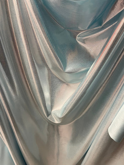 Lt blue metallic nylon spandex with foggy foil 4-way stretch 58/60” Sold by the YD. Ships Worldwide from Los Angeles California USA