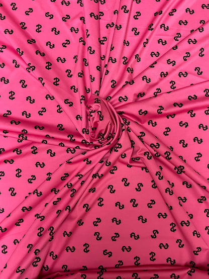 Money symbol design  pink/black print on best quality of nylon spandex 4-way stretch 58/60” Sold by the YD. Ships Worldwide from Los Angeles