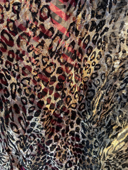 Exotic Leopard design on stretch lace 4-way 58/60” Sold by the YD. Ships Worldwide from Los Angeles California USA.