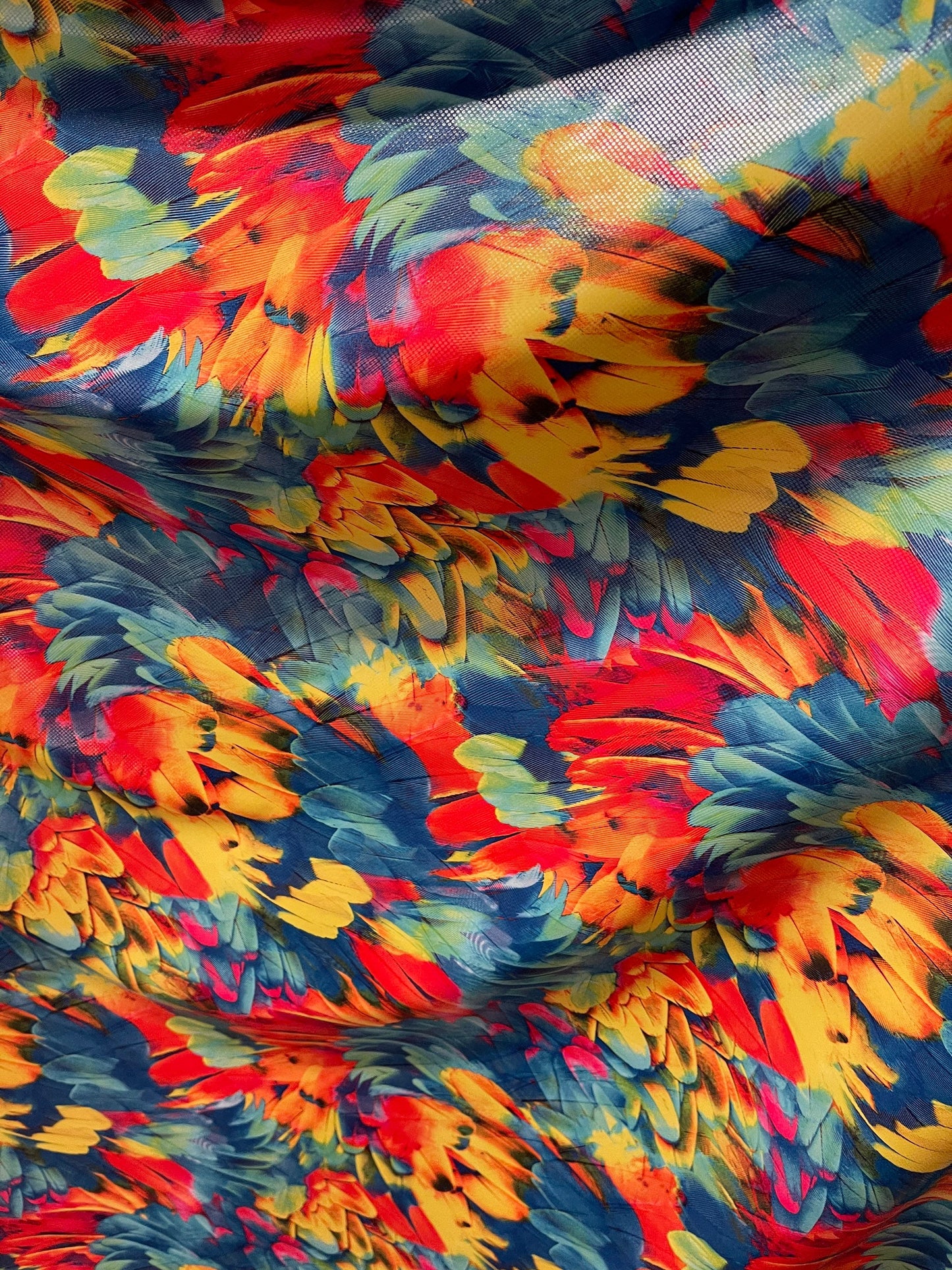 Exotic feathers design multicolor print on best quality of nylon spandex with clear dot 4-way stretch 58/60” Sold by the YD. Ships Worldwide