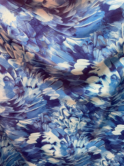 Exotic feathers design blue color print on best quality of nylon spandex with clear dot 4-way stretch 58/60” Sold by the YD. Ships Worldwide