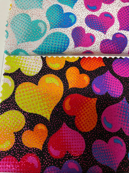 Multi heart design print on nylon spandex with foil 4way Stretch 58/60” Sold by the yd. Ships worldwide from Los Angeles California USA