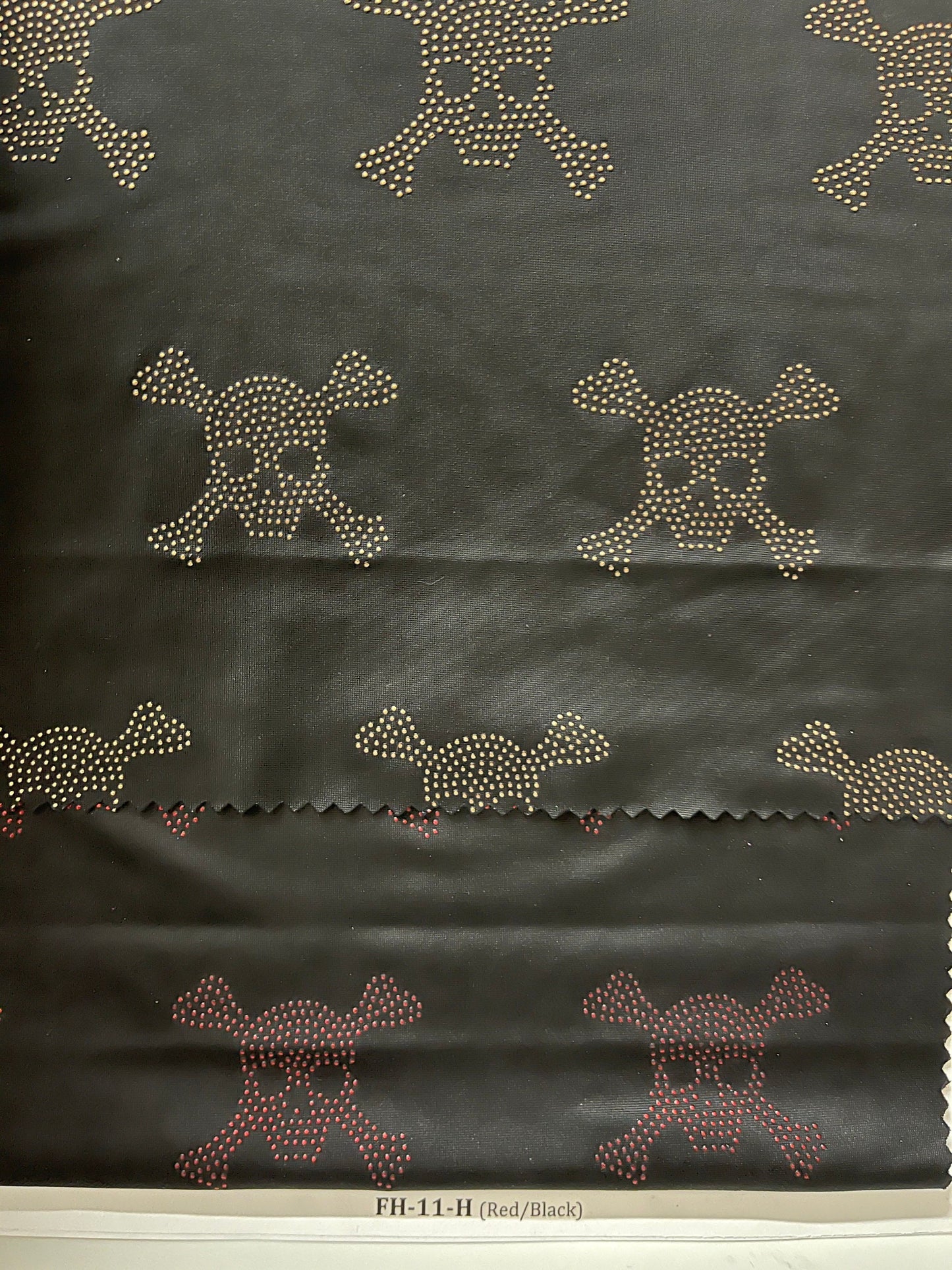 Skull design metallic poly spandex 4-way stretch 58/60” Sold by the YD. Ships Worldwide from Los Angeles California USA.