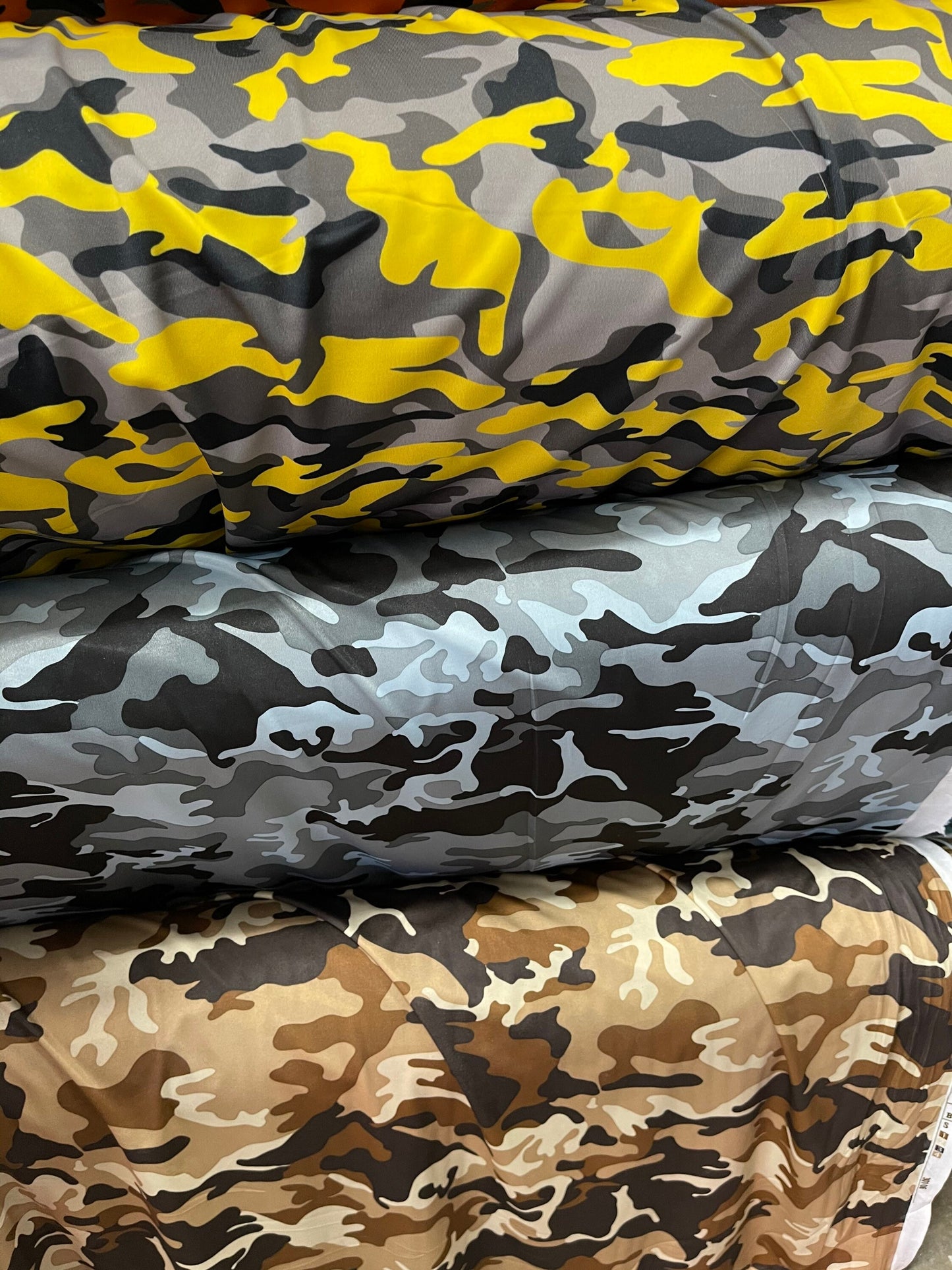 Camouflage design print on nylon spandex 4-way stretch 58/60” Sold by the YD. Ships Worldwide from Los Angeles California USA.