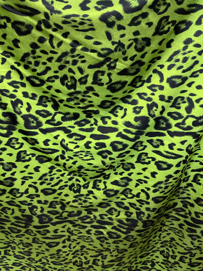 Exotic leopard design print on nylon spandex 4-way stretch Green /black 58/60” Sold by the YD. Ships Worldwide from Los Angeles California