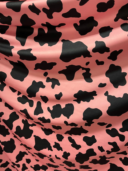 New Exotic cow design Blush/black print on best quality of nylon spandex 4-way stretch 58/60” Sold by the YD. Ships Worldwide