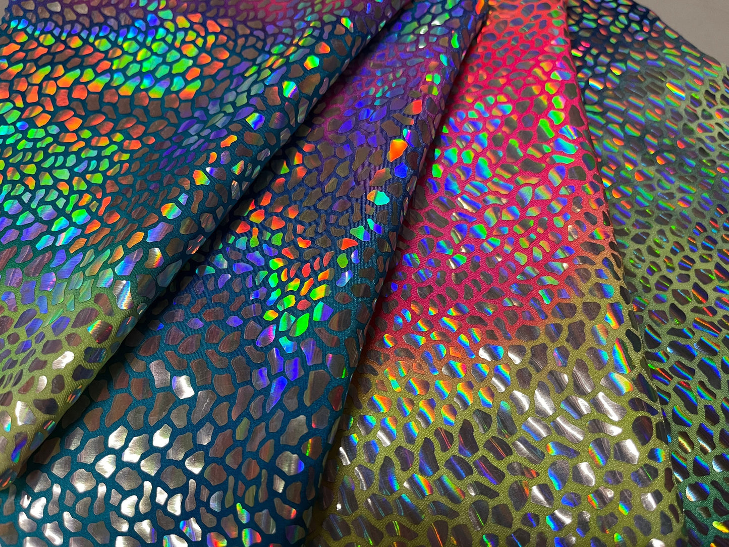 Dragón Holo trans Iridescence sequins on Tie Dye nylon spandex 4-way stretch 58/60” Sold by the YD. Ships Worldwide from Los Angeles cali