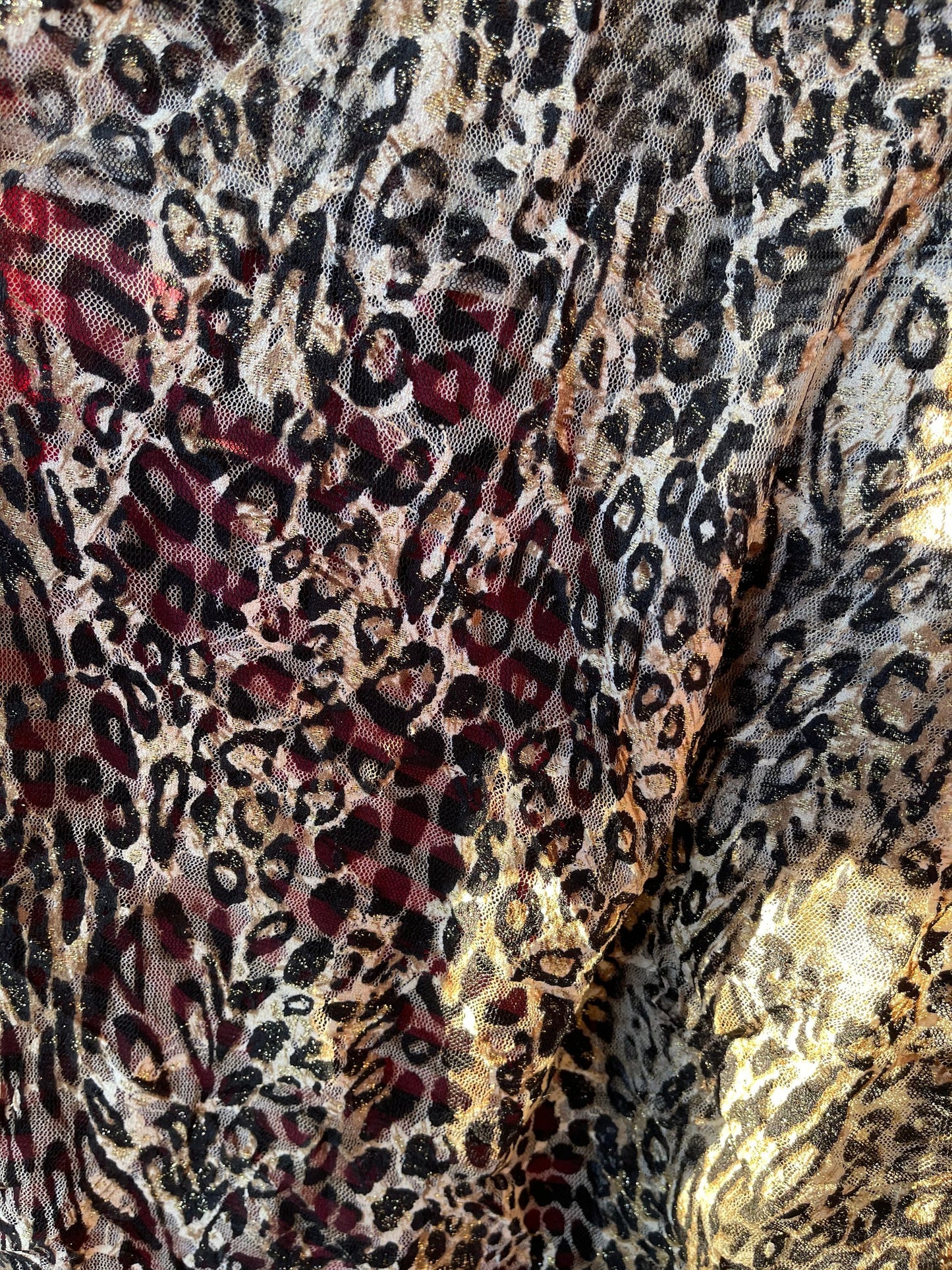 Exotic Leopard design on stretch lace 4-way 58/60” Sold by the YD. Ships Worldwide from Los Angeles California USA.