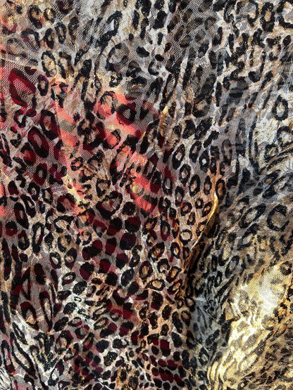 Exotic Leopard design on stretch lace 4-way 58/60” Sold by the YD. Ships Worldwide from Los Angeles California USA.