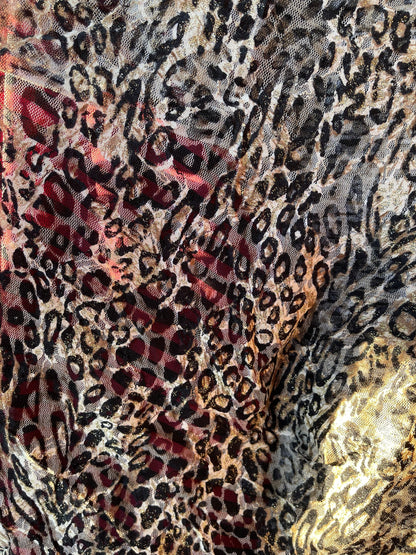 Exotic Leopard design on stretch lace 4-way 58/60” Sold by the YD. Ships Worldwide from Los Angeles California USA.