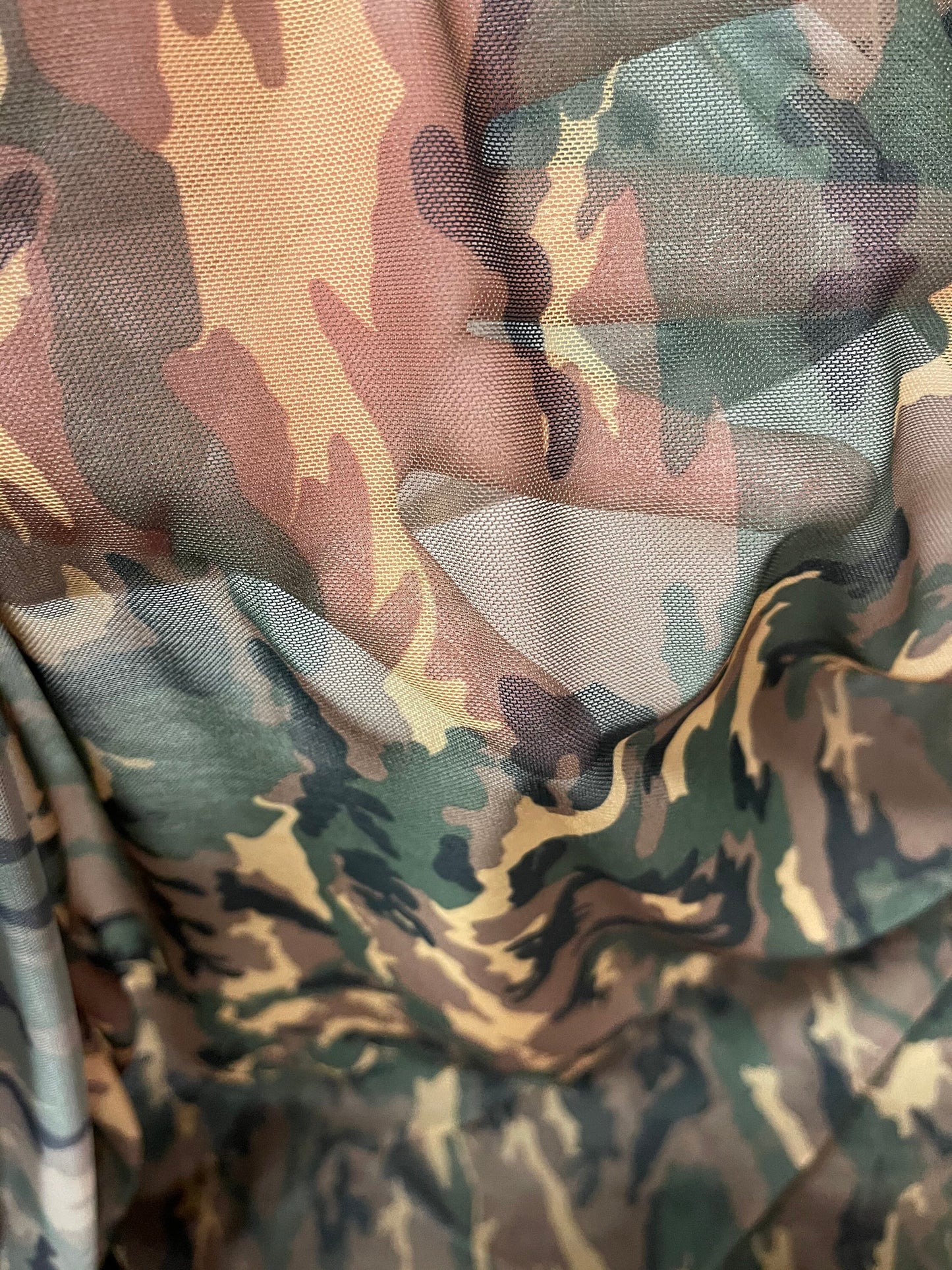 Camouflage design print on Power mesh 4-way stretch 58/60” Sold by the YD. Ships Worldwide from Los Ángeles California USA.