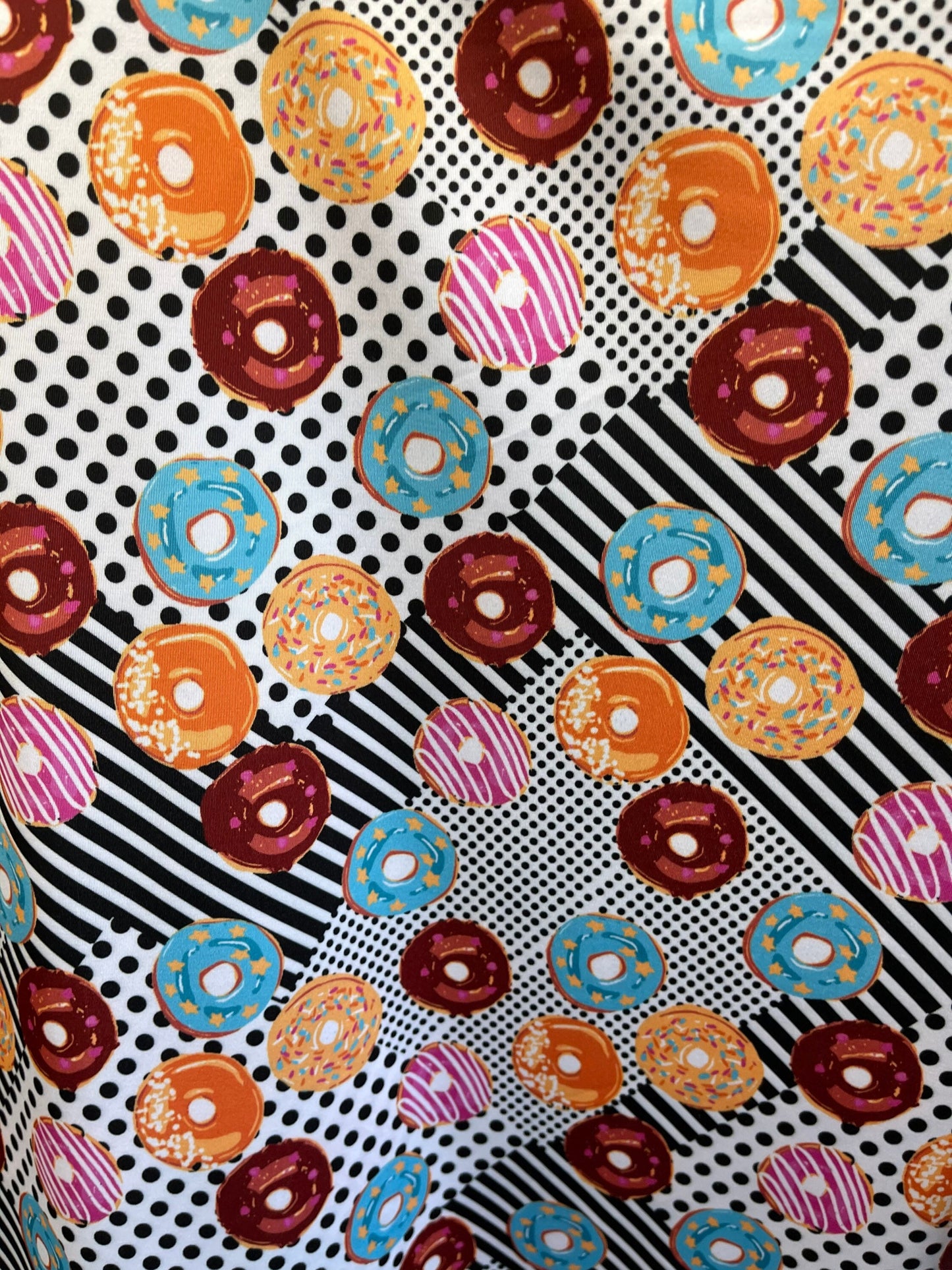 New Donuts design Multicolor print on great quality of nylon spandex 4-way stretch 58/60” Sold by the YD. Ships Worldwide from Los Ángeles