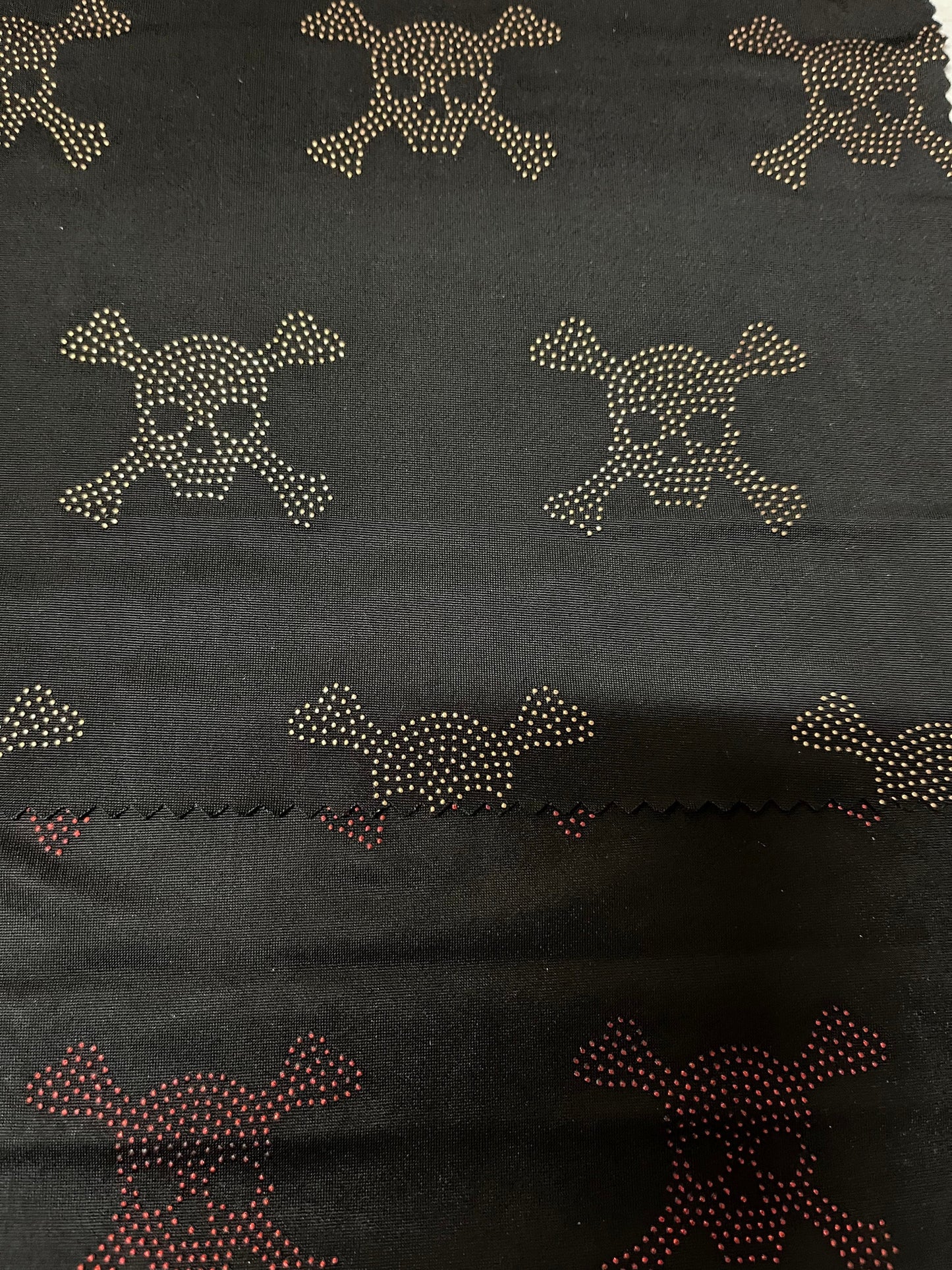 Skull design metallic poly spandex 4-way stretch 58/60” Sold by the YD. Ships Worldwide from Los Angeles California USA.