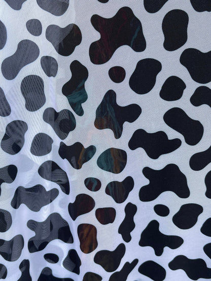 Cow design print on power mesh 4-way stretch 58/60” Sold by the YD. Ships Worldwide from Los Angeles California USA.