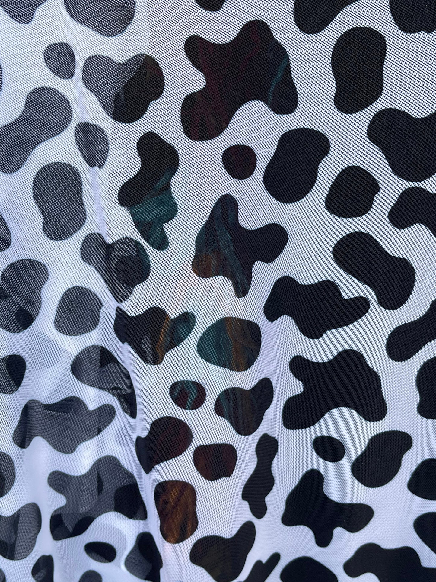 Cow design print on power mesh 4-way stretch 58/60” Sold by the YD. Ships Worldwide from Los Angeles California USA.