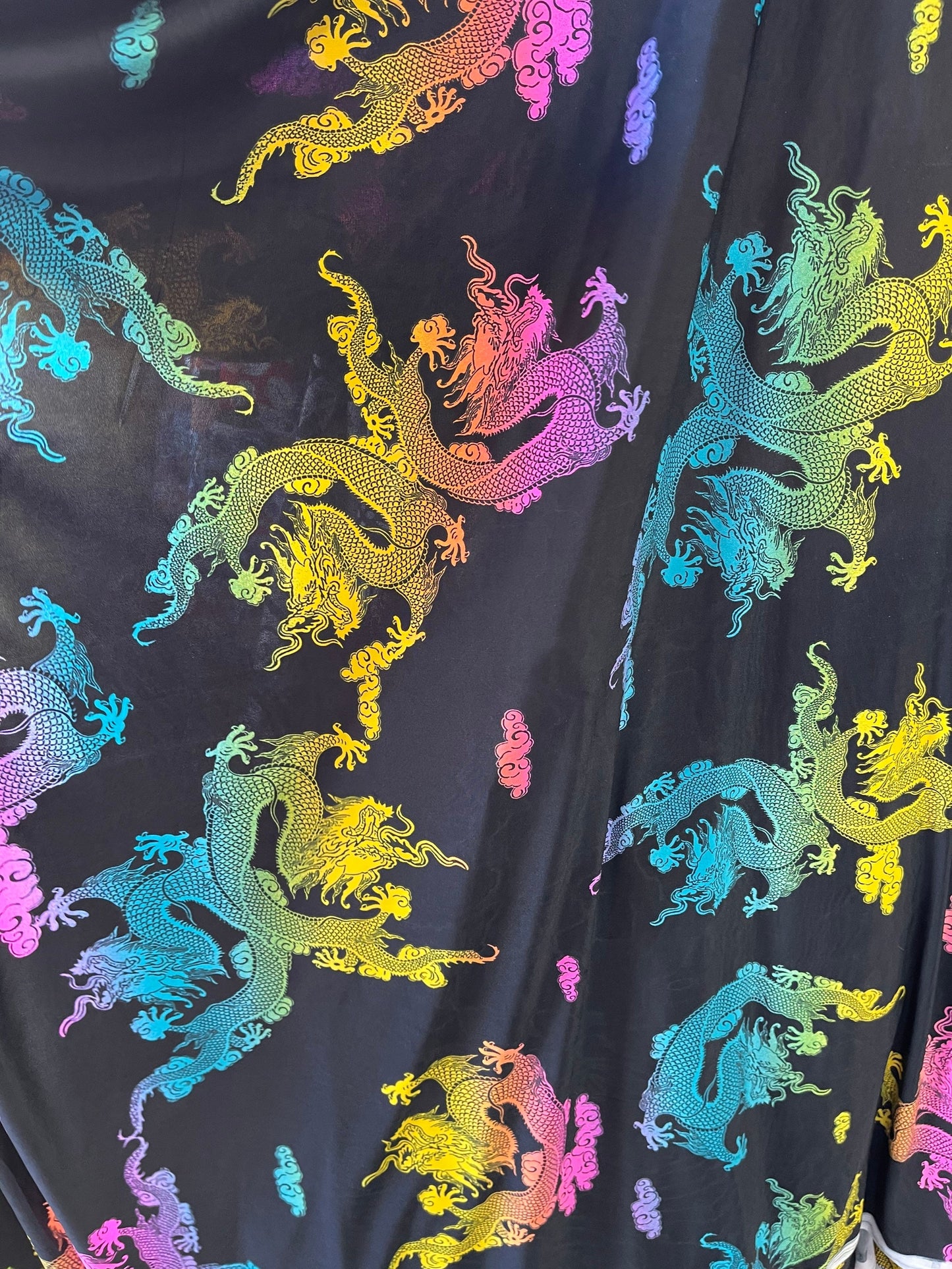 Dragon design Multicolor print on poly spandex light weight 4-way stretch 58/60” Sold by the YD. Ships Worldwide from Los Angeles California