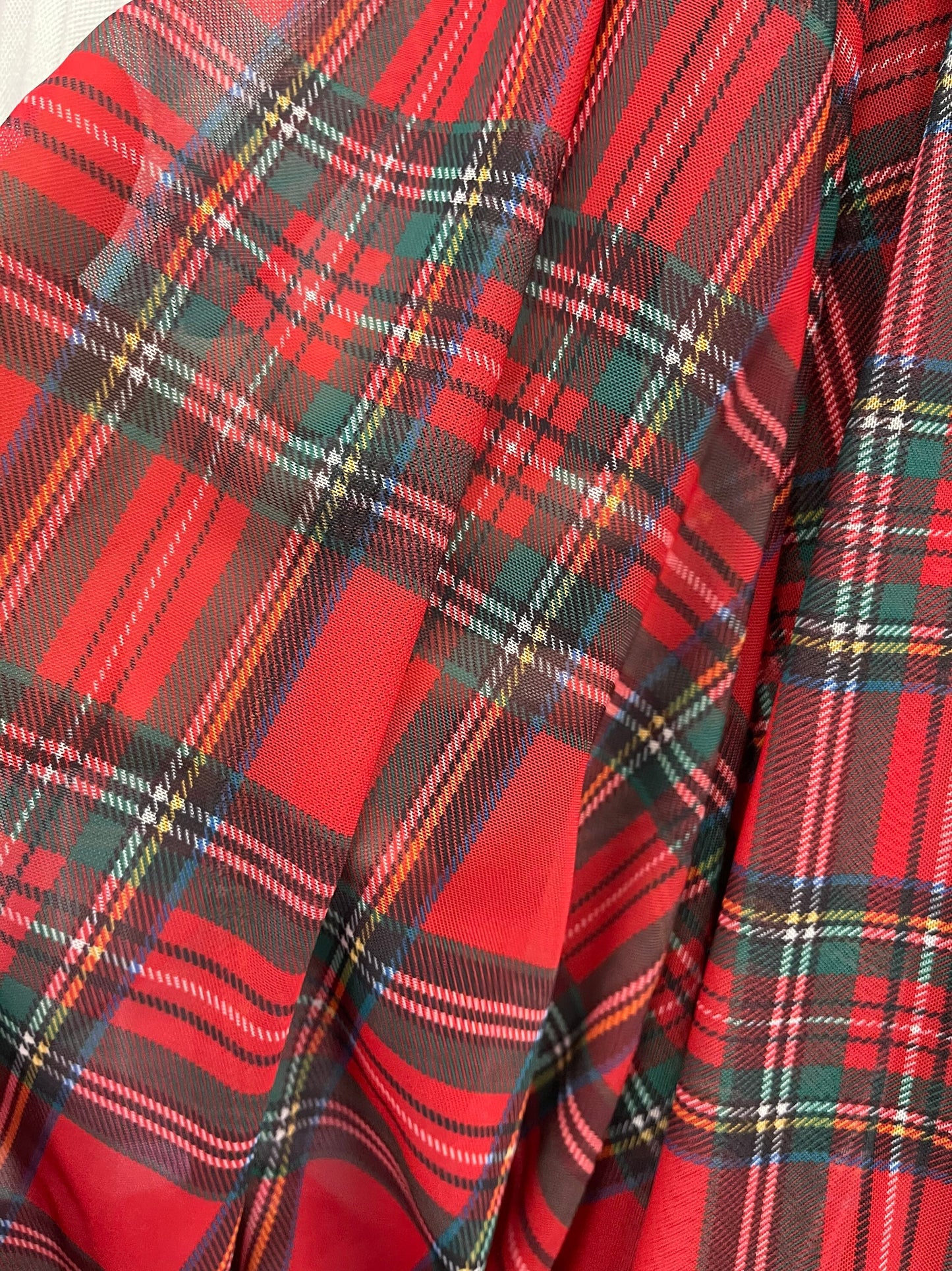 Plaid design print on great quality of mesh spandex 4-way stretch 58/60” Sold by the YD. Ships Worldwide from Los Angeles California USA.