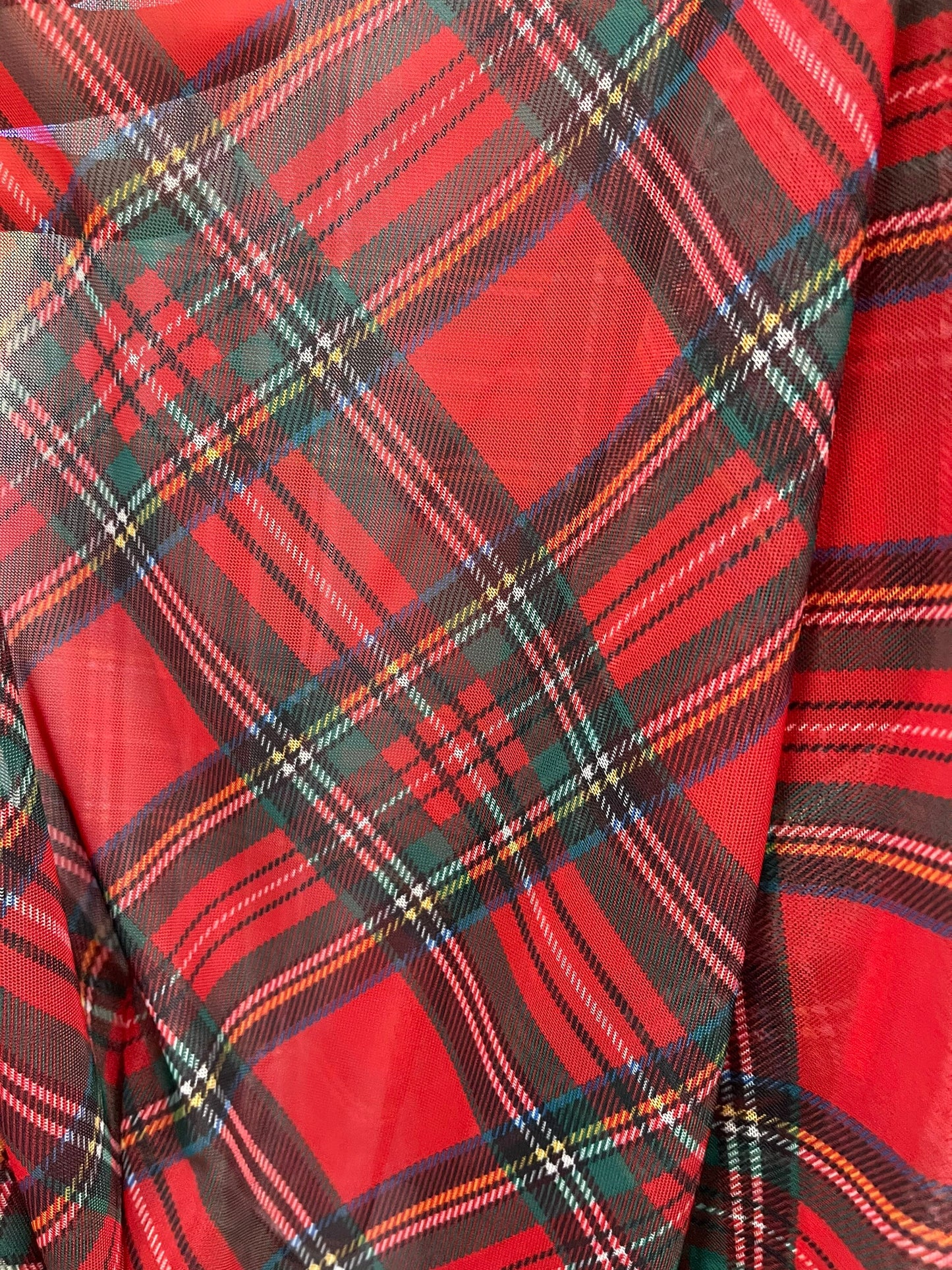 Plaid design print on great quality of mesh spandex 4-way stretch 58/60” Sold by the YD. Ships Worldwide from Los Angeles California USA.