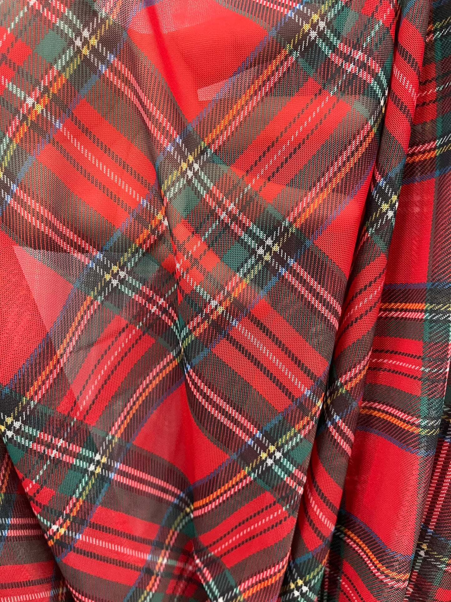 Plaid design print on great quality of mesh spandex 4-way stretch 58/60” Sold by the YD. Ships Worldwide from Los Angeles California USA.