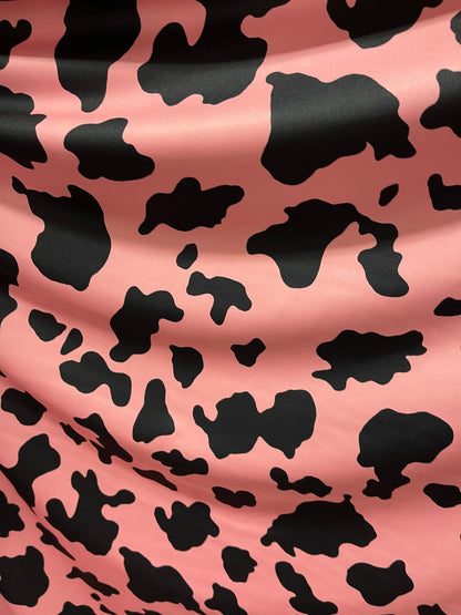 New Exotic cow design Blush/black print on best quality of nylon spandex 4-way stretch 58/60” Sold by the YD. Ships Worldwide