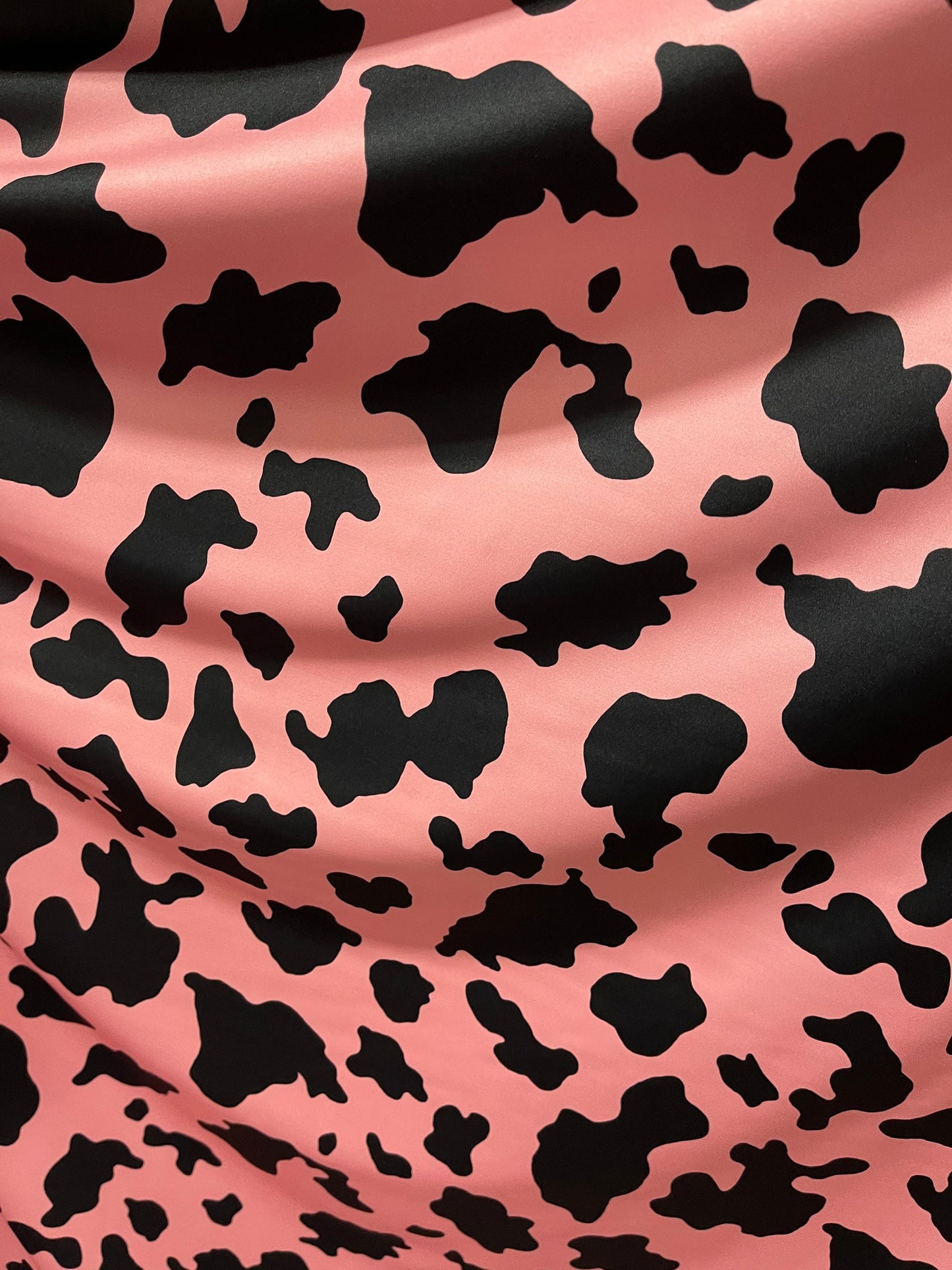 New Exotic cow design Blush/black print on best quality of nylon spandex 4-way stretch 58/60” Sold by the YD. Ships Worldwide