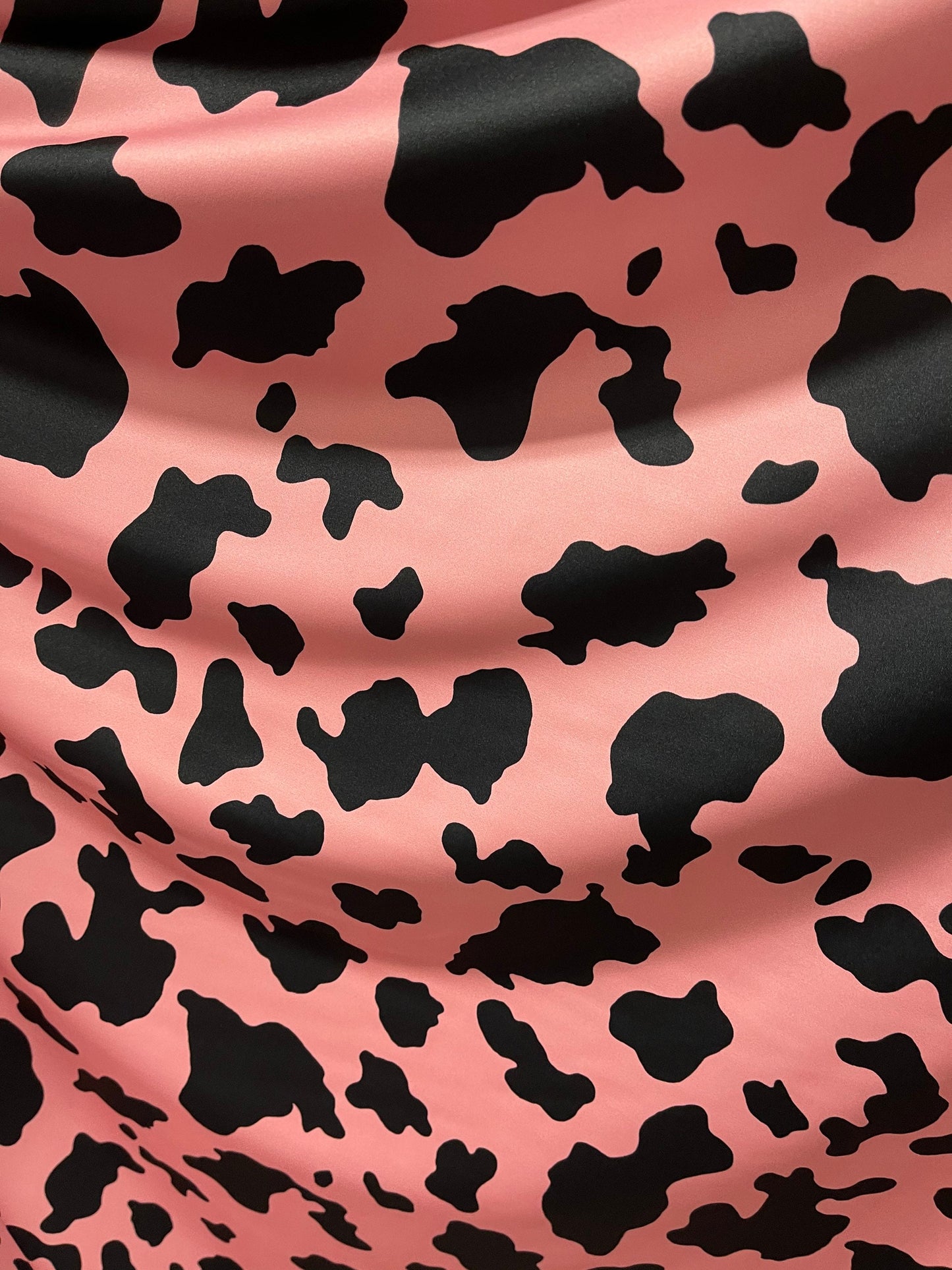 New Exotic cow design Blush/black print on best quality of nylon spandex 4-way stretch 58/60” Sold by the YD. Ships Worldwide