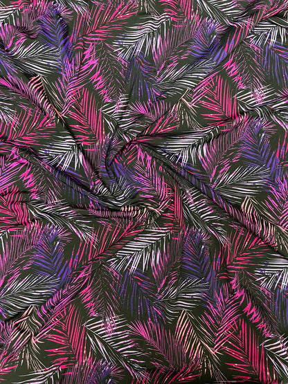 Tropical leaves design Black/Multicolor print on nylon spandex 4-way stretch 58/60” Sold by the YD. Ships Worldwide from Los Angeles CA