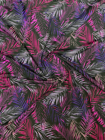 Tropical leaves design Black/Multicolor print on nylon spandex 4-way stretch 58/60” Sold by the YD. Ships Worldwide from Los Angeles CA