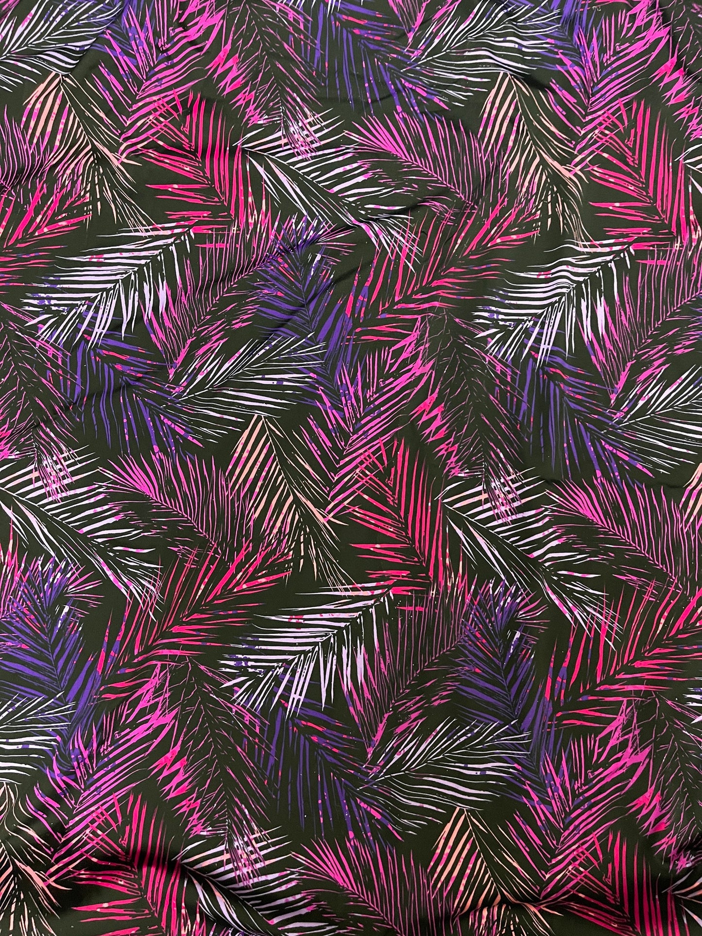 Tropical leaves design Black/Multicolor print on nylon spandex 4-way stretch 58/60” Sold by the YD. Ships Worldwide from Los Angeles CA