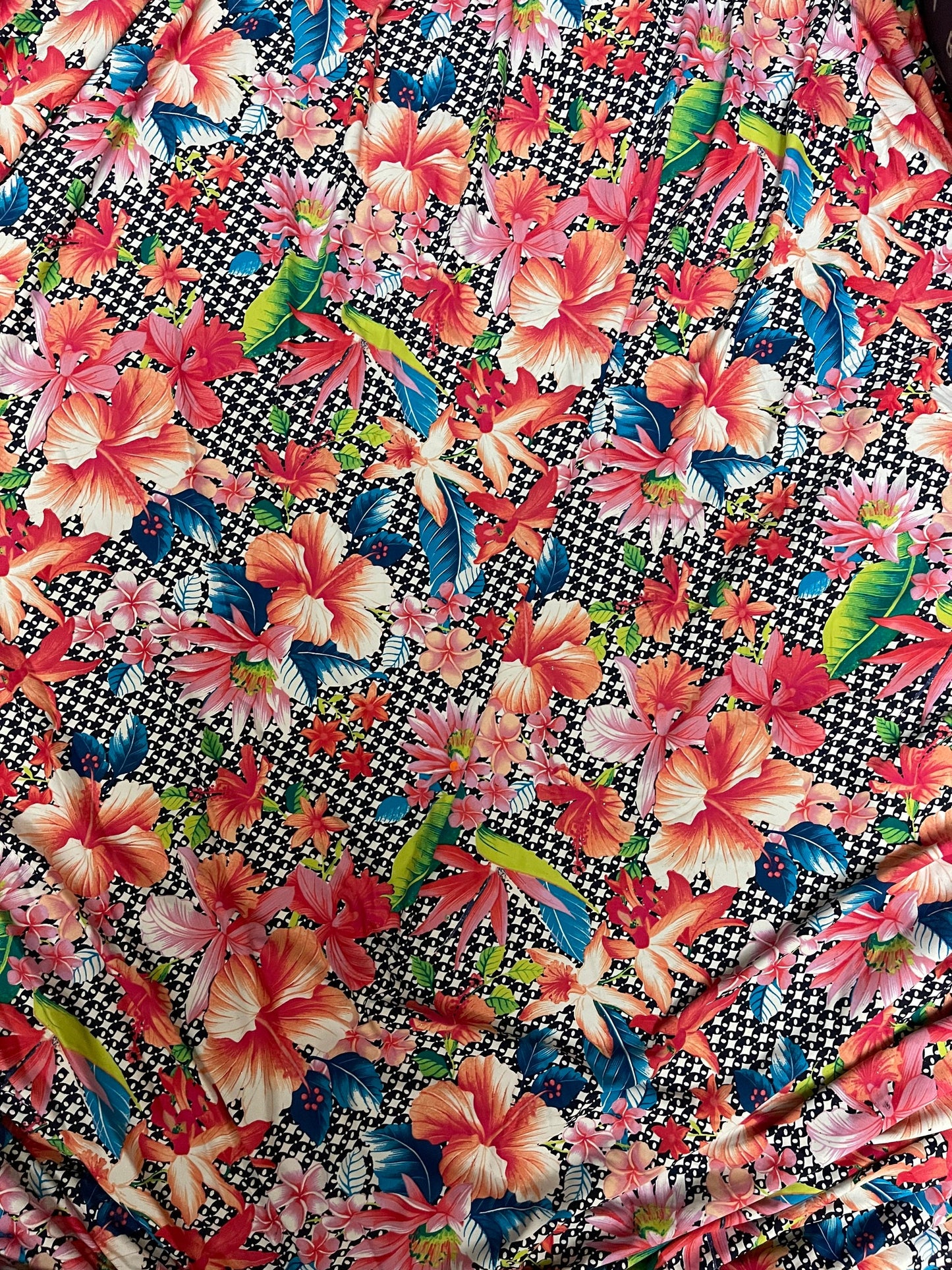 Multi Flower design print on great quality of Poly Spandex 4-way stretch 58/60” Sold by the YD. Ships Worldwide from Los Angeles California