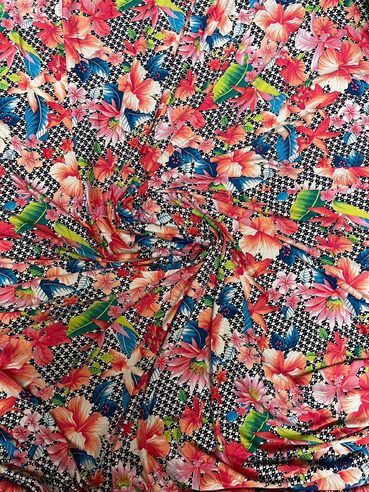 Multi Flower design print on great quality of Poly Spandex 4-way stretch 58/60” Sold by the YD. Ships Worldwide from Los Angeles California