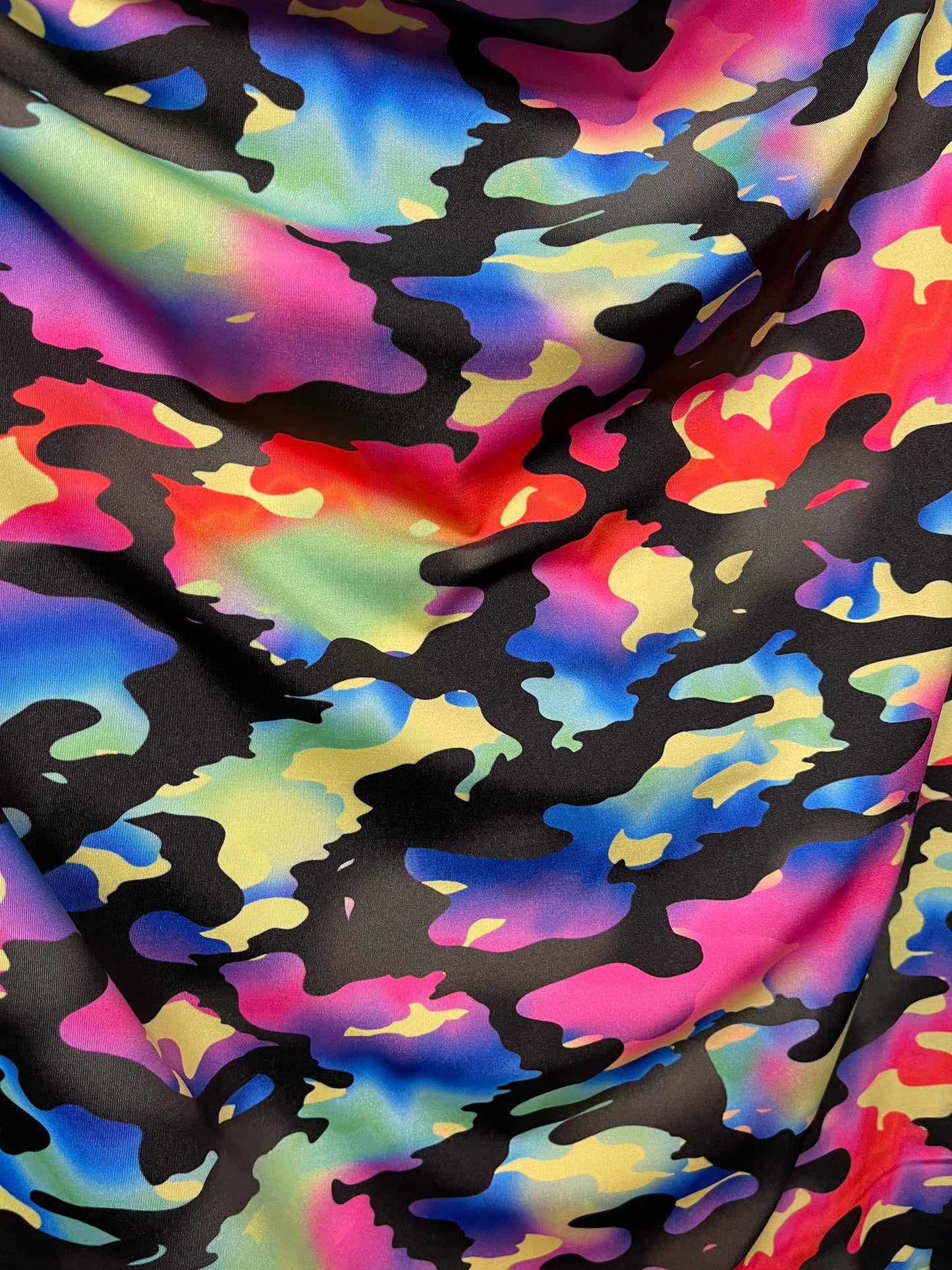 New camouflage rainbow design print on nylon spandex 4-way stretch 58/60” Sold by the YD. Ships Worldwide from Los Angeles California USA.