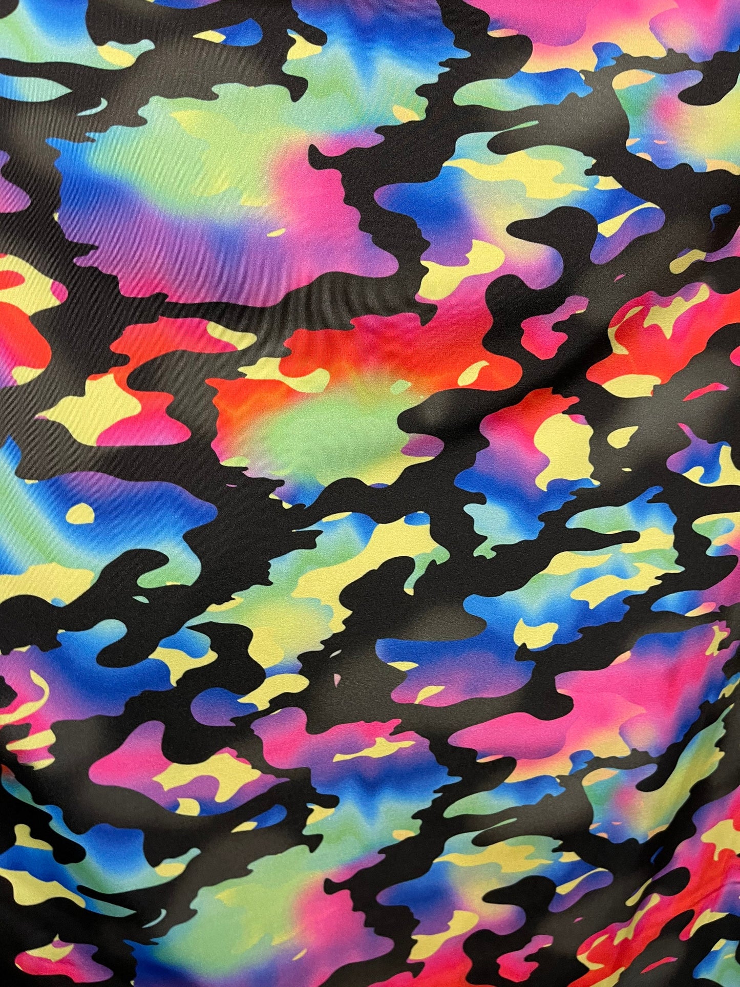 New camouflage rainbow design print on nylon spandex 4-way stretch 58/60” Sold by the YD. Ships Worldwide from Los Angeles California USA.