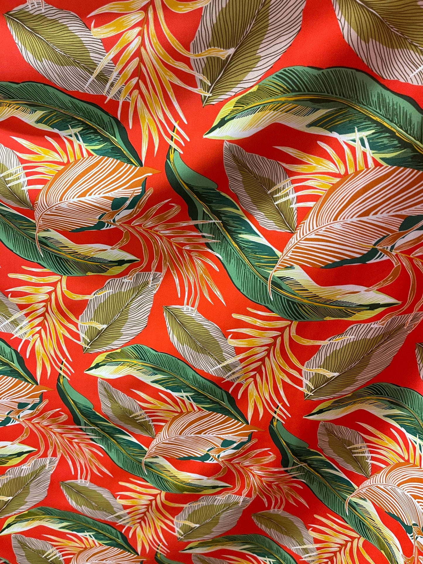 Tropical Leaf design print on super techno 2-way stretch 58/60” Sold by the YD. Ships Worldwide from Los Angeles California USA