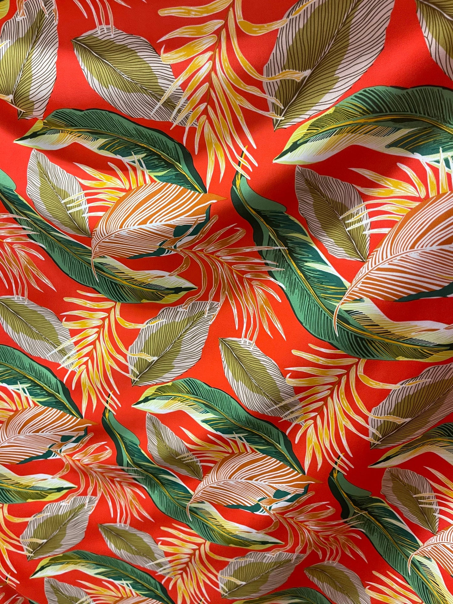 Tropical Leaf design print on super techno 2-way stretch 58/60” Sold by the YD. Ships Worldwide from Los Angeles California USA