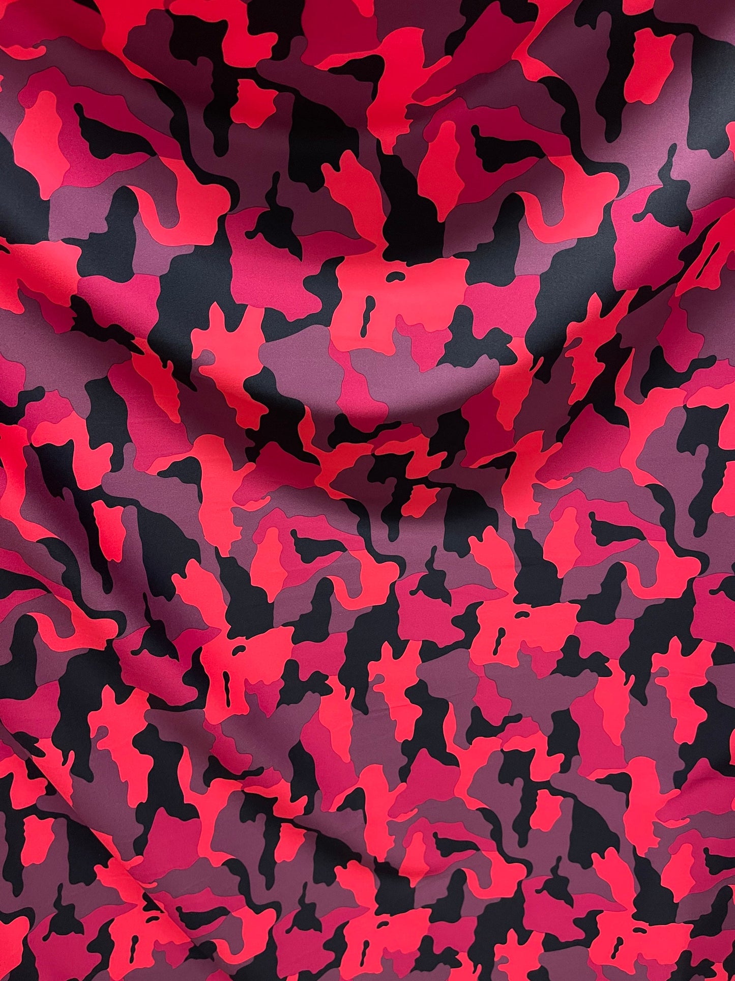 Camouflage design Berry/Rose/multi print on best quality of nylon spandex 4-way stretch 58/60” Sold by the YD. Ships Worldwide from L.A CA.