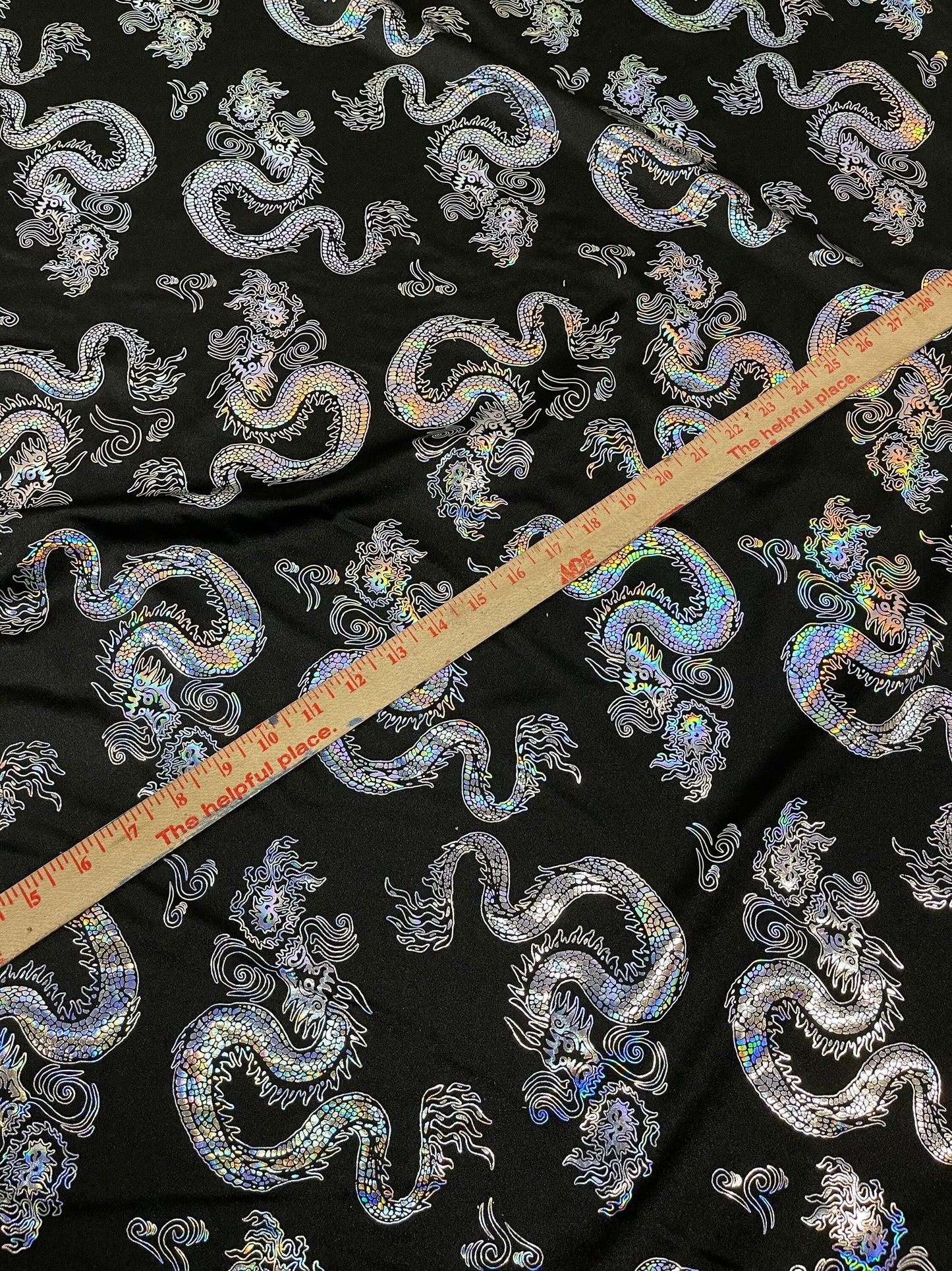 New Dragon design print on metallic nylon spandex 4-way stretch 58/60” Sold by the YD. Ships worldwide from Los Ángeles California USA.