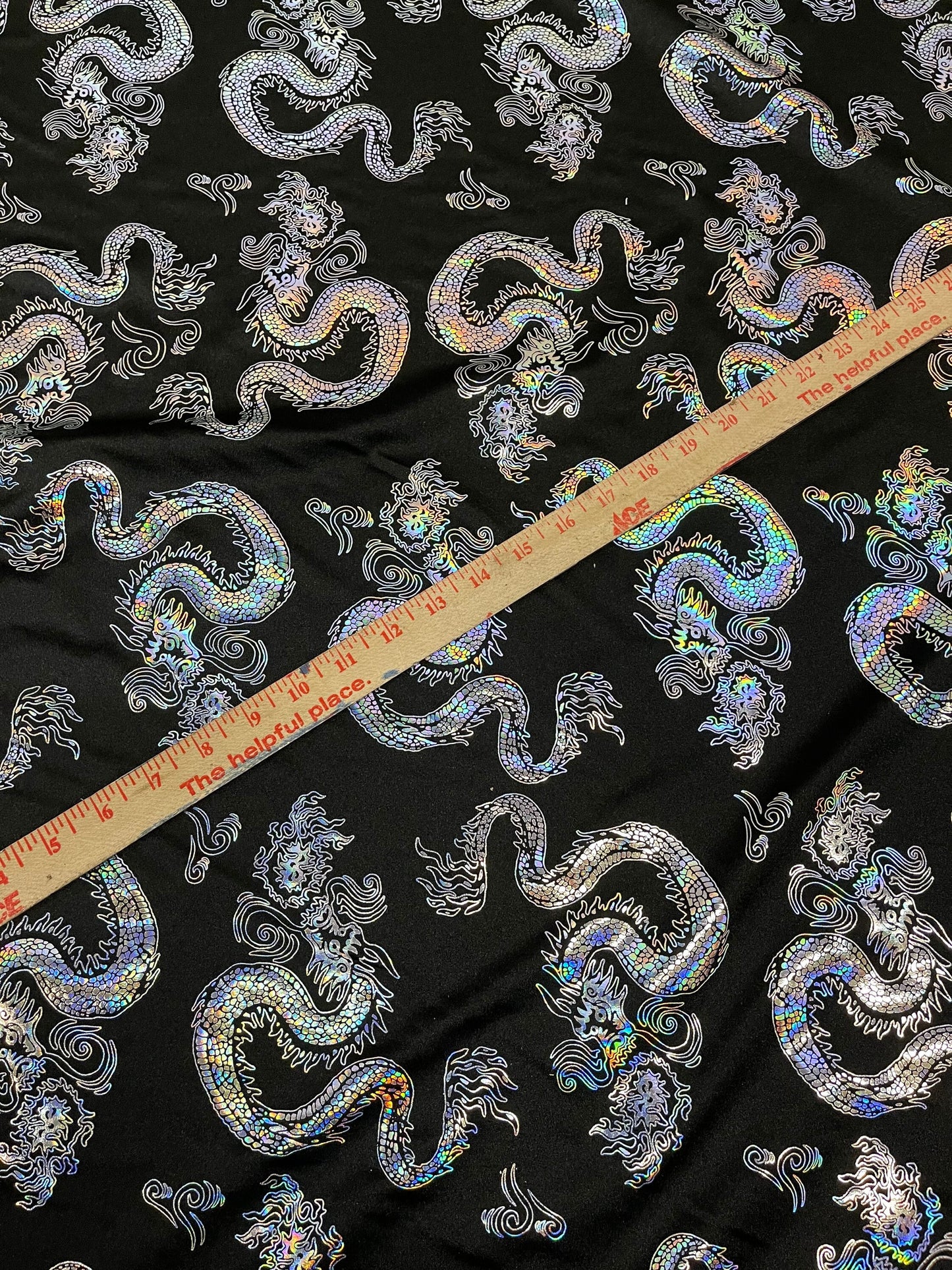 New Dragon design print on metallic nylon spandex 4-way stretch 58/60” Sold by the YD. Ships worldwide from Los Ángeles California USA.