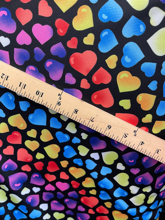 New Love me Heart design Black multicolor print on great quality of nylon spandex 4-way stretch 58/60” Sold by the YD. Ships Worldwide