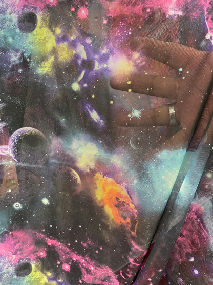 Galaxy design multicolor print on power mesh 4-way stretch 58/60” Sold by the YD. Ships Worldwide from Los Angeles California USA.