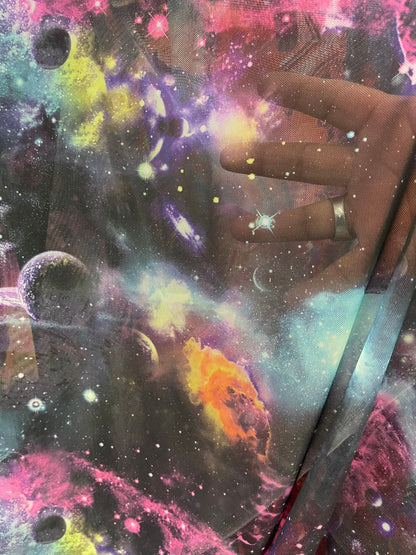 Galaxy design multicolor print on power mesh 4-way stretch 58/60” Sold by the YD. Ships Worldwide from Los Angeles California USA.