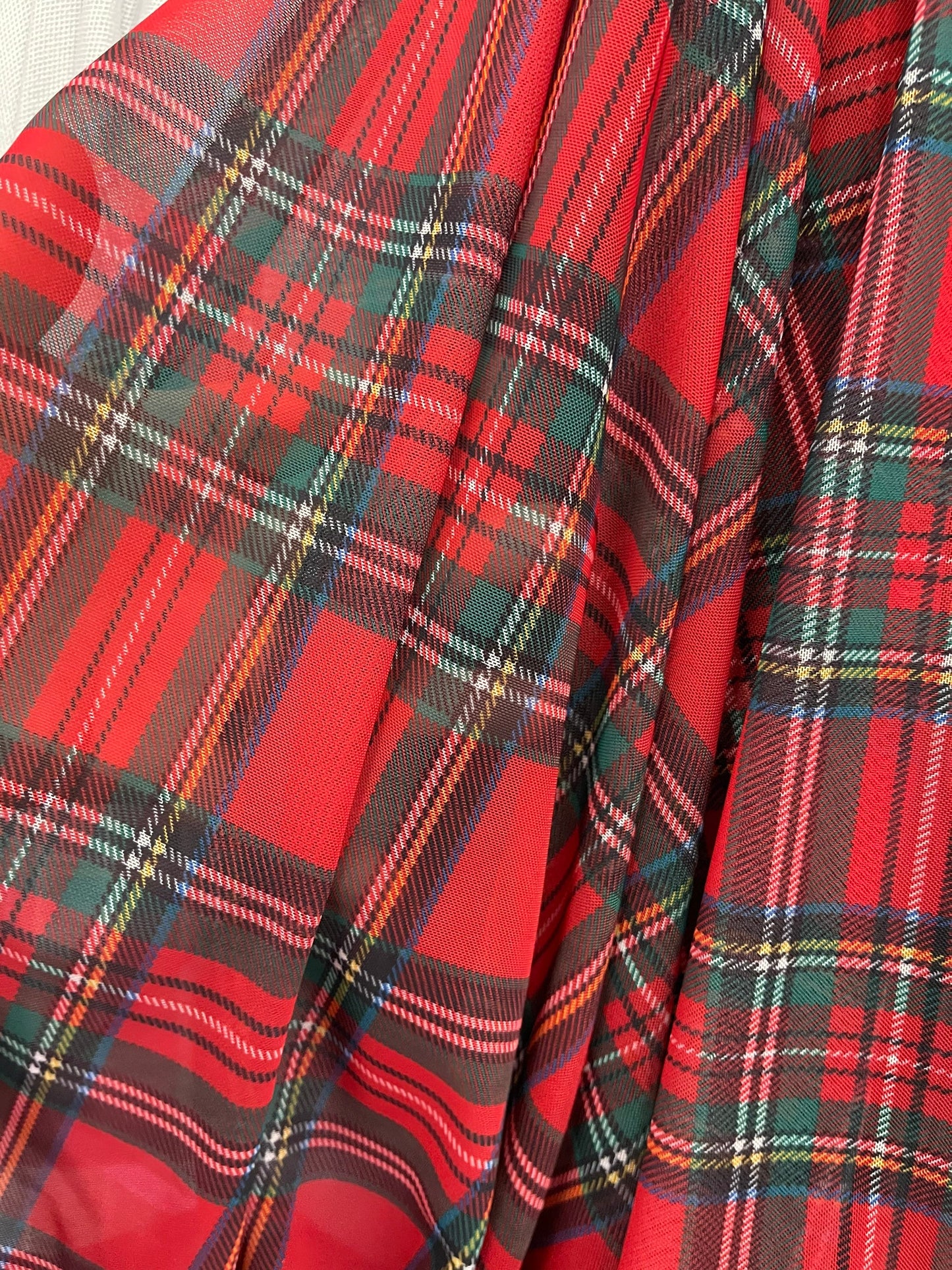 Plaid design print on great quality of mesh spandex 4-way stretch 58/60” Sold by the YD. Ships Worldwide from Los Angeles California USA.