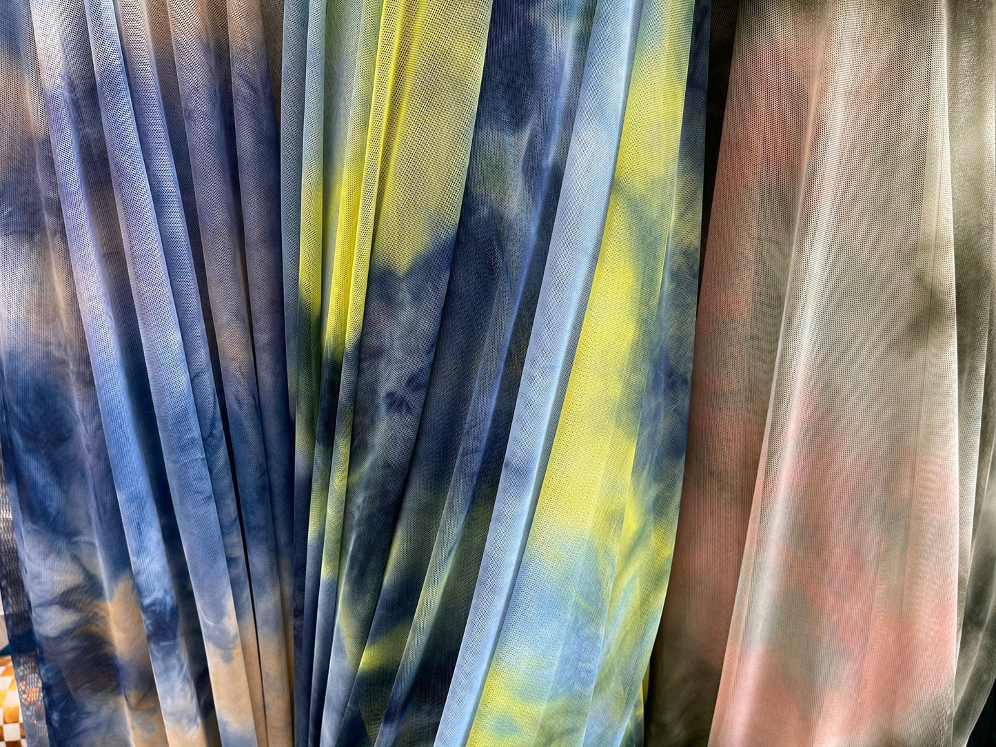 Tie dye design on power mesh multicolor 4-way stretch 58/60” Sold by the YD. Ships Worldwide from Los Angeles California USA.