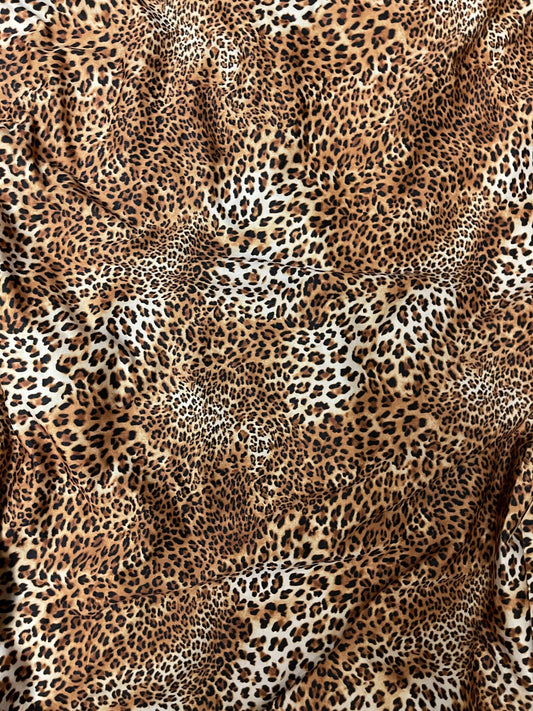 Exotic cheetah design print on poly spandex 4-way stretch 58/60” Sold by the YD. Ships Worldwide from Los Ángeles California USA.